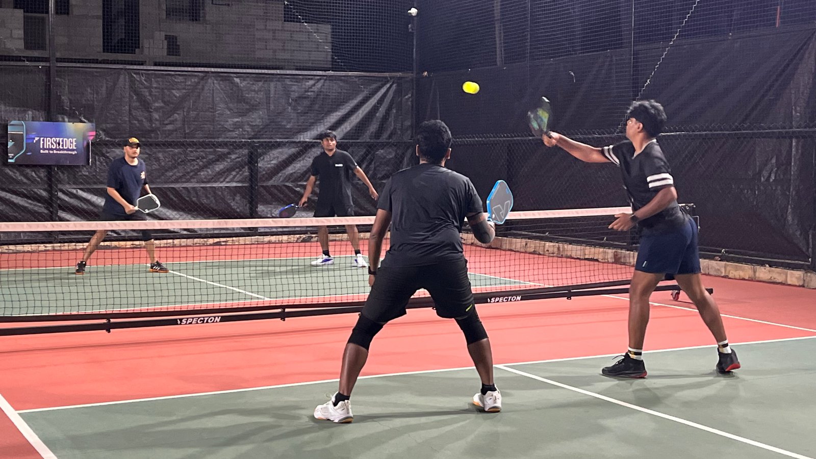 Players on court at 212° Club